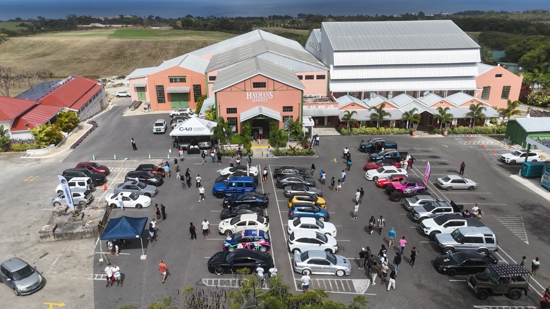 Aerial view of cars gathered at Haymans Market