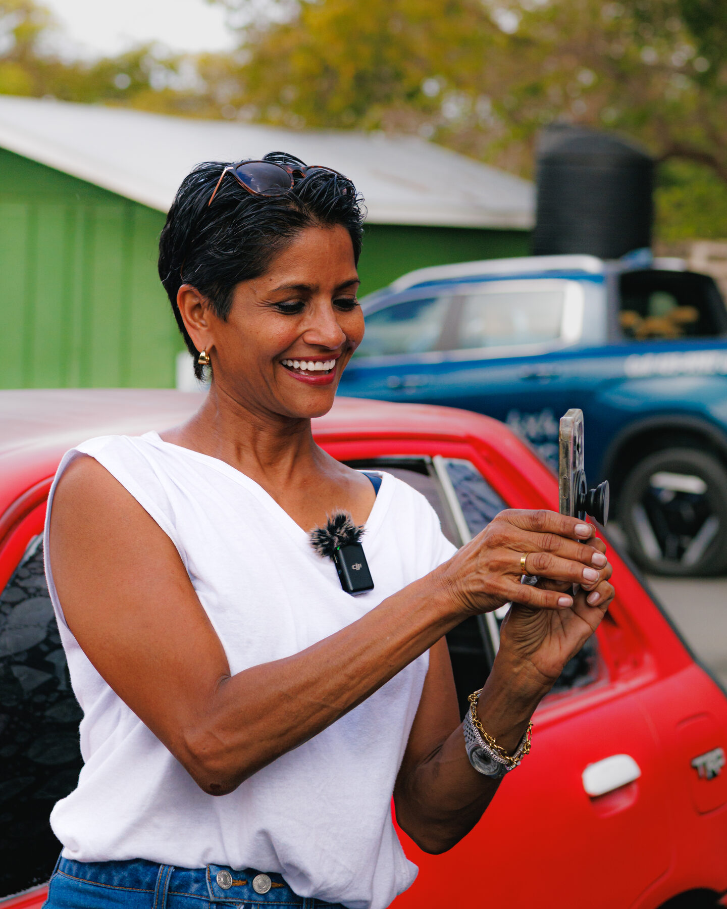 Candid attendee moment at Cars and Coffee Barbados