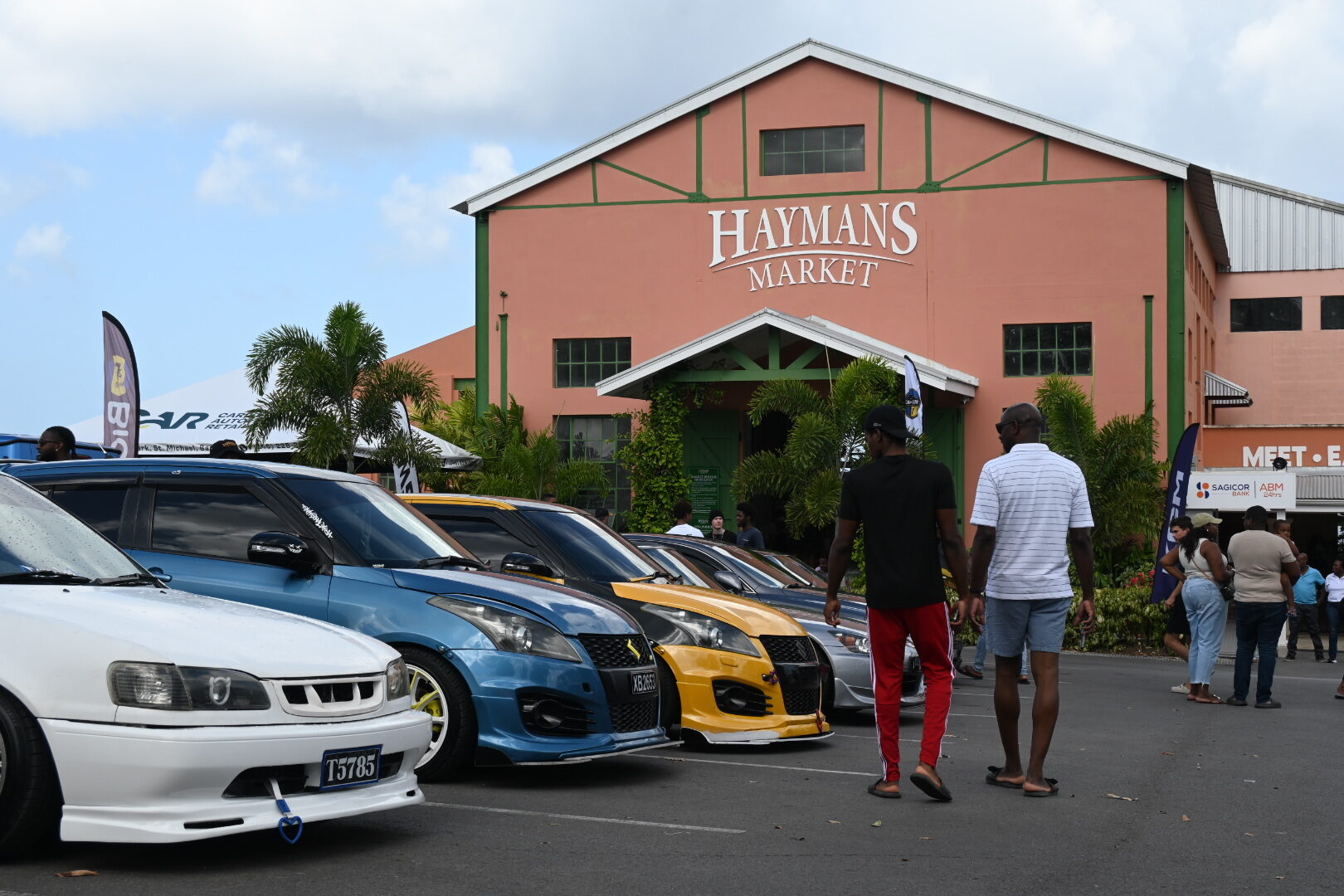 Cars lined up outside Haymans Market during Cars and Coffee Barbados