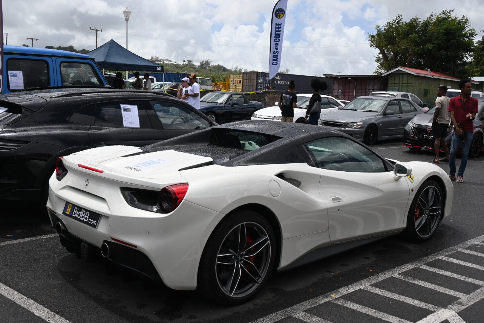 White Ferrari parked at the Haymans Market Cars and Coffee meet