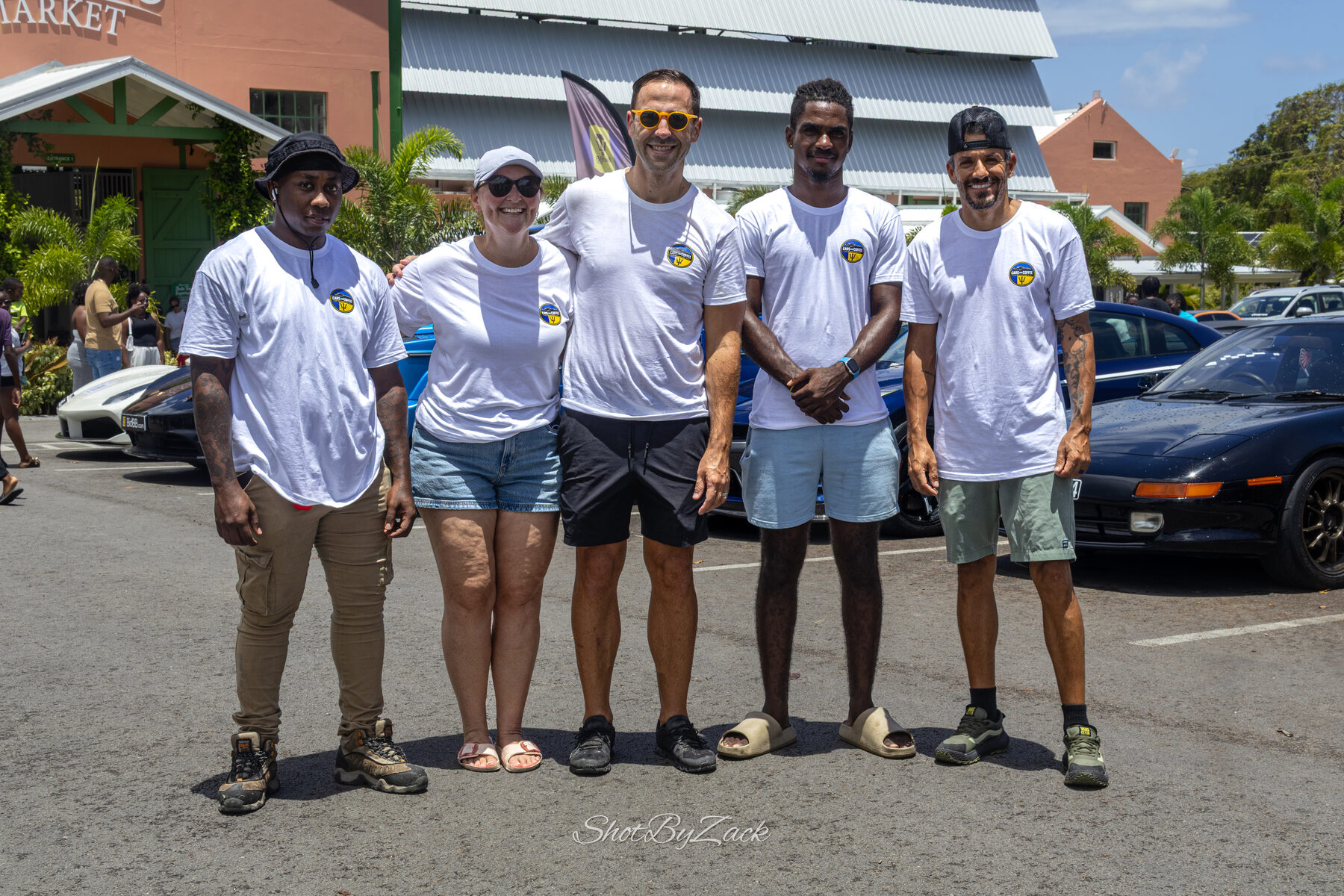Cars and Coffee Barbados crew standing together at Haymans Market